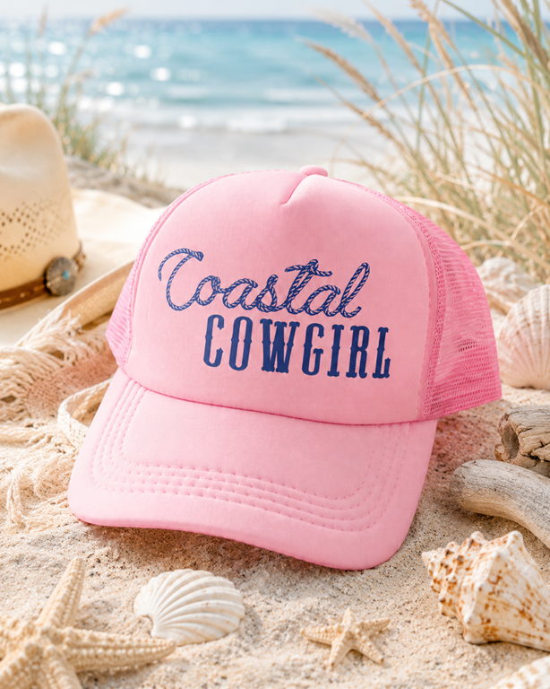 A handmade Coastal Cowgirl hat styled on the beach
